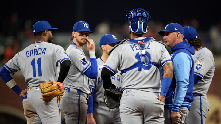 May 20, 2025; San Francisco, California, USA; Kansas City Royals manager Matt Quatraro (33) meets his team on the mound for a pitching change against the San Francisco Giants during the sixth inning at Oracle Park. Mandatory Credit: Robert Edwards-Imagn Images
