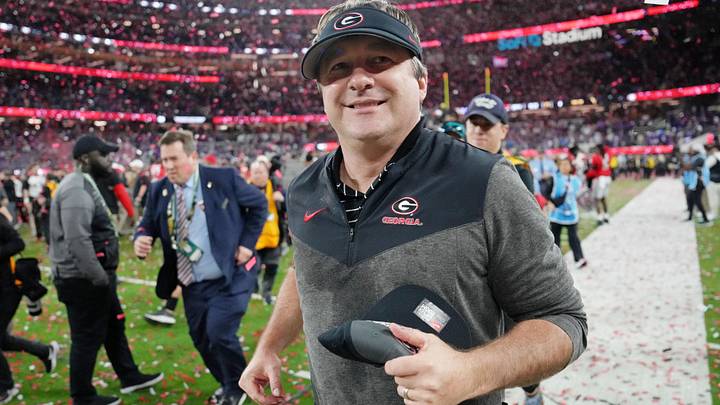 Jan 9, 2023; Inglewood, CA, USA; Georgia Bulldogs head coach Kirby Smart runs off the field after winning the CFP national championship game against the TCU Horned Frogs at SoFi Stadium. Mandatory Credit: Kirby Lee-Imagn Images