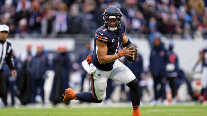 Dec 10, 2023; Chicago, Illinois, USA;  Chicago Bears quarterback Justin Fields (1) against the Detroit Lions at Soldier Field. Mandatory Credit: Jamie Sabau-USA TODAY Sports