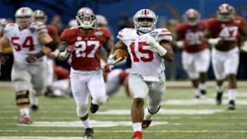 Ohio State's Ezekiel Elliott breaks away from Alabama defenders on an 85-yard touchdown jaunt in the 2015 Sugar Bowl.

Main art