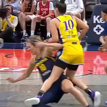 Kelsey Plum wasn't called for a foul on this play vs. the Fever.