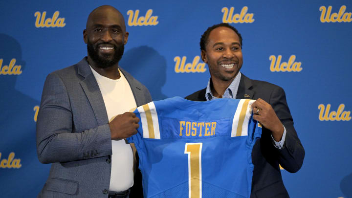 UCLA Bruins athletic director Martin Jarmond, right,  with new head football coach DeShaun Foster during a press conference at Pauley Pavilion.  Mandatory Credit: Jayne Kamin-Oncea-USA TODAY Sports