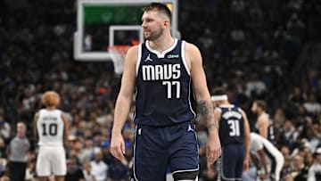 Luka Doncic walks up the court