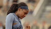 Coco Gauff of the United States reacts to a point during her match  against Madison Keys at Roland Garros Stadium.  
