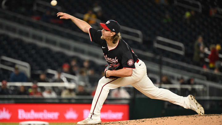 Apr 3, 2024; Washington, District of Columbia, USA; Washington Nationals relief pitcher Hunter Harvey (73) pitches against the Pittsburgh Pirates during the seventh inning at Nationals Park. Mandatory Credit: Rafael Suanes-USA TODAY Sports