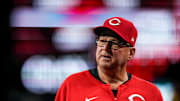 Cincinnati Reds manager Terry Francona (77) returns to the dugout after checking on center fielder TJ Friedl (29) in the third inning of the MLB interleague game between the Cincinnati Reds and the Chicago White Sox at Great American Ball Park in Cincinnati on Tuesday, May 13, 2025. The score was 0-0 after three innings.