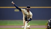 Oct 14, 2025; Milwaukee, Wisconsin, USA; Milwaukee Brewers pitcher Freddy Peralta (51) throws pitch against the Los Angeles Dodgers in the first inning during game two of the NLCS round for the 2025 MLB playoffs at American Family Field. Mandatory Credit: Michael McLoone-Imagn Images