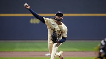 Oct 14, 2025; Milwaukee, Wisconsin, USA; Milwaukee Brewers pitcher Freddy Peralta (51) throws pitch against the Los Angeles Dodgers in the first inning during game two of the NLCS round for the 2025 MLB playoffs at American Family Field. Mandatory Credit: Michael McLoone-Imagn Images