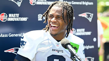 Jul 23, 2025; Foxborough, MA, USA; New England Patriots wide receiver DeMario Douglas (3) reacts to a question from the media after practice during day one of training camp at Gillette Stadium. Mandatory Credit: Eric Canha-Imagn Images