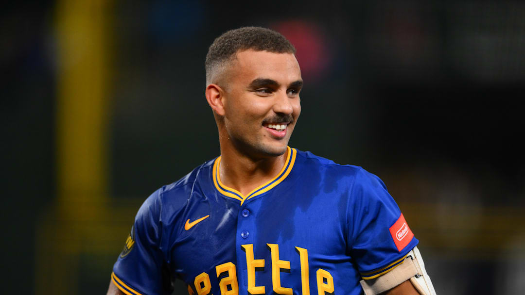 Sep 11, 2025; Seattle, Washington, USA; Seattle Mariners catcher Harry Ford (5) celebrates after the Mariners defeated the Los Angeles Angels at T-Mobile Park. Mandatory Credit: Steven Bisig-Imagn Images