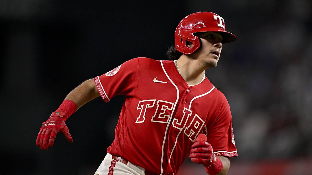 May 29, 2026; Arlington, Texas, USA;  Texas Rangers second baseman Nicky Lopez (33) rounds the bases after he hits a two run home run against the Kansas City Royals during the sixth inning at Globe Life Field. Mandatory Credit: Jerome Miron-Imagn Images