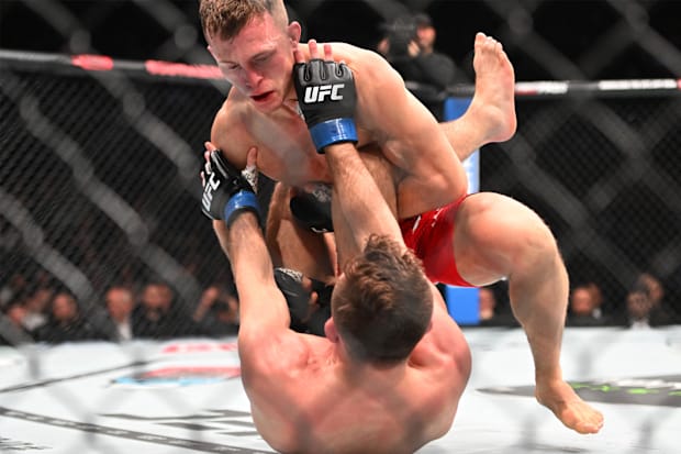 Brad Katona (red glove) fights Garrett Armfield (blue gloves) during UFC 297 at ScotiaBank Arena.
