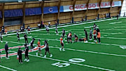 Caleb Williams and QBs  run through handoff drills during OTAs.