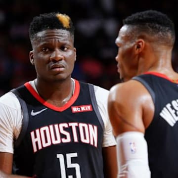 Nov 19, 2019; Houston, TX, USA; Houston Rockets guard Russell Westbrook (0), Houston Rockets center Clint Capela (15), and Houston Rockets guard James Harden (13) talk during game against the Portland Trail Blazers at Toyota Center in Houston. /Cato Cataldo/via Getty Images