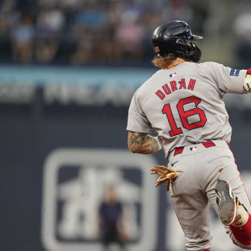 Jun 19, 2024; Toronto, Ontario, CAN; Boston Red Sox right fielder Jarren Duran (16) runs the bases after hitting a home run against the Toronto Blue Jays during fifth inning at Rogers Centre.