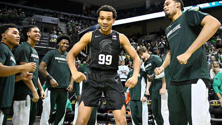 Jan 20, 2026; Eugene, Oregon, USA; Michigan State Spartans guard Divine Ugochukwu (99) is introduced before the game against the Oregon Ducks at Matthew Knight Arena. Mandatory Credit: Craig Strobeck-Imagn Images