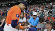 Aug 29, 2025; Houston, Texas, USA; Houston Astros right fielder Cam Smith (11) signs autographs before playing against the Los Angeles Angels at Daikin Park.