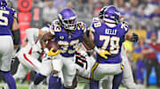 Sep 14, 2025; Minneapolis, Minnesota, USA; Minnesota Vikings running back Aaron Jones Sr. (33) runs the ball during the first half against the Atlanta Falcons at U.S. Bank Stadium. Mandatory Credit: Jeffrey Becker-Imagn Images