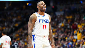 Nov 14, 2023; Denver, Colorado, USA; LA Clippers forward P.J. Tucker (17) reacts to a turnover in the second half against the Denver Nuggets at Ball Arena. Mandatory Credit: Ron Chenoy-Imagn Images