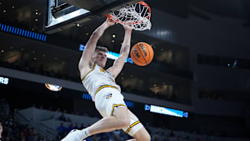 Mar 20, 2025; Wichita, KS, USA; Missouri Tigers guard Caleb Grill (31) dunks in the second half of a first round men’s NCAA Tournament game against the Drake Bulldogs at Intrust Bank Arena. Mandatory Credit: Kirby Lee-Imagn Images