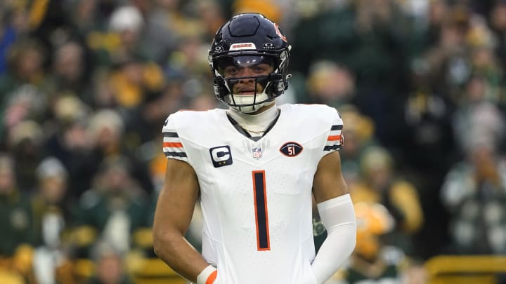 Jan 7, 2024; Green Bay, Wisconsin, USA;  Chicago Bears quarterback Justin Fields (1) during the game against the Green Bay Packers at Lambeau Field. Mandatory Credit: Jeff Hanisch-USA TODAY Sports