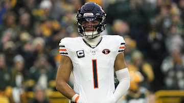 Jan 7, 2024; Green Bay, Wisconsin, USA;  Chicago Bears quarterback Justin Fields (1) during the game against the Green Bay Packers at Lambeau Field. Mandatory Credit: Jeff Hanisch-Imagn Images
