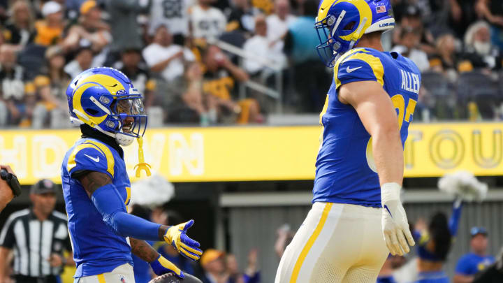 Oct 22, 2023; Inglewood, California, USA; Los Angeles Rams wide receiver Tutu Atwell celebrates with center Brian Allen.