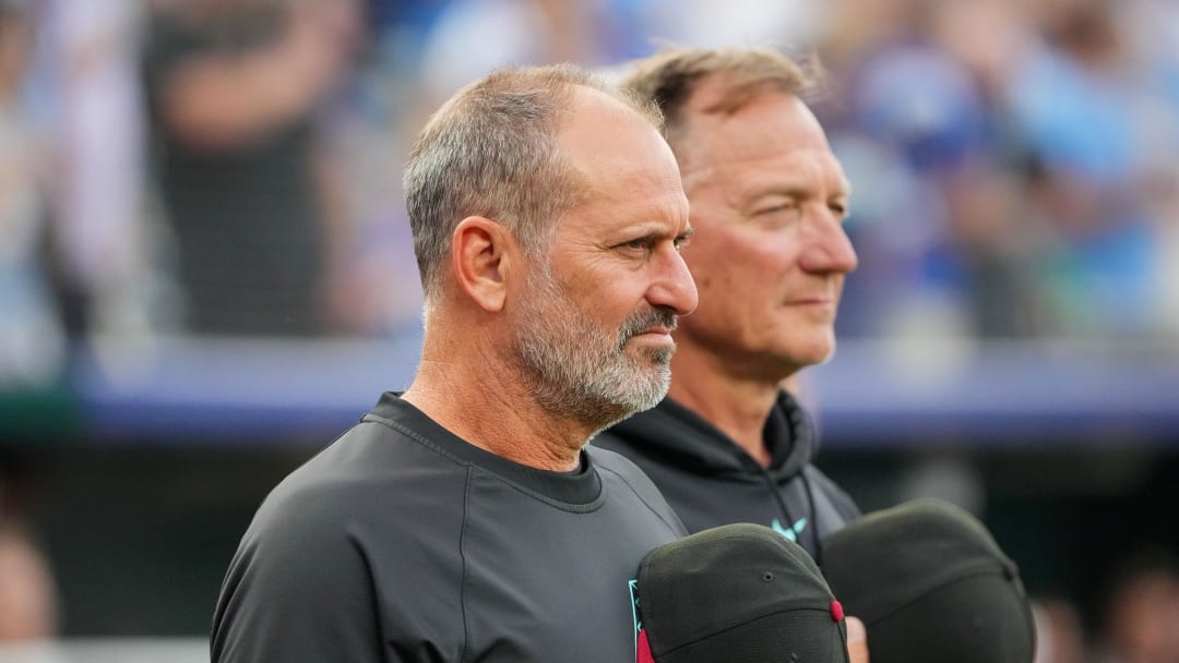 Jul 24, 2024; Kansas City, Missouri, USA; Arizona Diamondbacks manager Torey Lovullo (17) stands on the field during the national anthem prior to a game against the Kansas City Royals at Kauffman Stadium. Mandatory Credit: Denny Medley-USA TODAY Sports