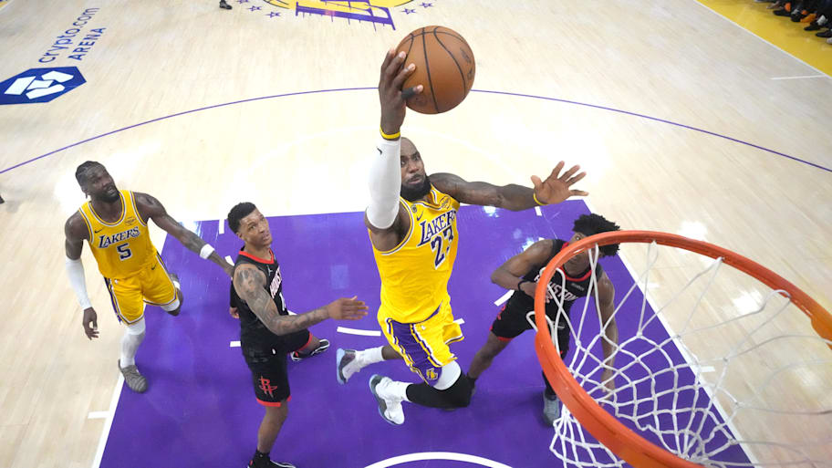 Los Angeles Lakers forward LeBron James shoots the ball against Houston Rockets .