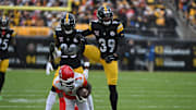 Dec 25, 2024; Pittsburgh, Pennsylvania, USA; Pittsburgh Steelers safety Minkah Fitzpatrick (39) reacts after tackling Kansas City Chiefs wide receiver Xavier Worthy (1) during the second quarter at Acrisure Stadium. Mandatory Credit: Barry Reeger-Imagn Images