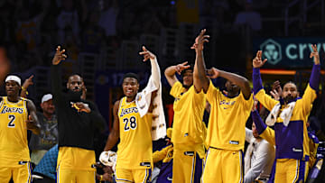 Apr 11, 2025; Los Angeles, California, USA; Los Angeles Lakers forward Jarred Vanderbilt (2), forward LeBron James (23), forward Rui Hachimura (28), center Jaxson Hayes (11), and Los Angeles Lakers guard Gabe Vincent (7) celebrate after scoring against the Houston Rockets during the second half at Crypto.com Arena. Mandatory Credit: Jonathan Hui-Imagn Images