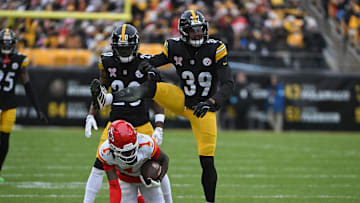Dec 25, 2024; Pittsburgh, Pennsylvania, USA; Pittsburgh Steelers safety Minkah Fitzpatrick (39) reacts after tackling Kansas City Chiefs wide receiver Xavier Worthy (1) during the second quarter at Acrisure Stadium. Mandatory Credit: Barry Reeger-Imagn Images