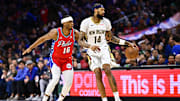 Mar 8, 2024; Philadelphia, Pennsylvania, USA; New Orleans Pelicans forward Brandon Ingram (14) spins with the ball against Philadelphia 76ers guard Ricky Council IV (16) in the second quarter at Wells Fargo Center. Mandatory Credit: Kyle Ross-Imagn Images