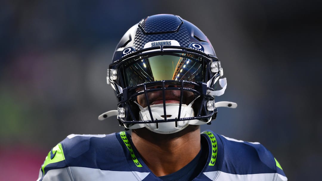 Seattle Seahawks running back Kenneth Walker III warming up. Seattle Seahawks running back Kenneth Walker III warming up.