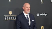 Rich Eisen poses on the NFL Honors red carpet.