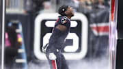Nov 9, 2025; Houston, Texas, USA; Houston Texans cornerback Kamari Lassiter (4) runs onto the field before the game against the Jacksonville Jaguars at NRG Stadium. Mandatory Credit: Troy Taormina-Imagn Images