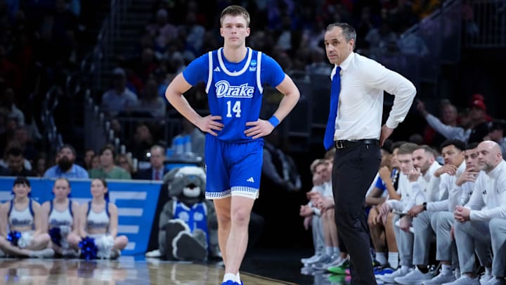 Mar 22, 2025; Wichita, KS, USA; Drake Bulldogs guard Bennett Stirtz (14) talks with head coach Ben McCollum during the second half at Intrust Bank Arena. Mandatory Credit: Kirby Lee-Imagn Images