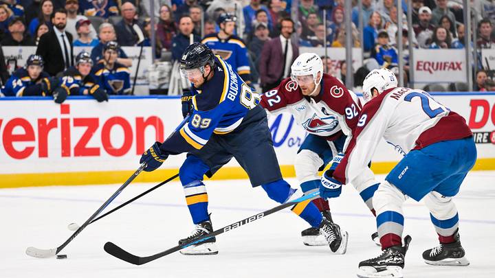 Apr 7, 2026; St. Louis, Missouri, USA; St. Louis Blues left wing Pavel Buchnevich (89) controls the puck as Colorado Avalanche left wing Gabriel Landeskog (92) and center Nathan MacKinnon (29) defend during the second period at Enterprise Center. Mandatory Credit: Jeff Curry-Imagn Images