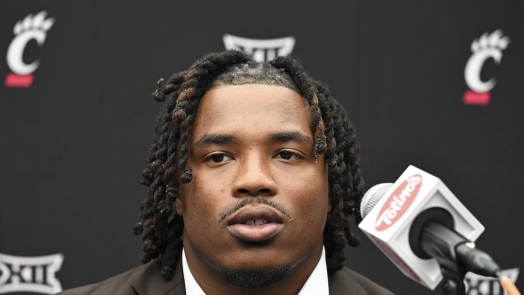 Jul 9, 2024; Las Vegas, NV, USA; Cincinnati running back Corey Kiner speaks to the media during the Big 12 Media Days at Allegiant Stadium. Mandatory Credit: Candice Ward-USA TODAY Sports Jul 9, 2024; Las Vegas, NV, USA; Cincinnati running back Corey Kiner speaks to the media during the Big 12 Media Days at Allegiant Stadium. Mandatory Credit: Candice Ward-USA TODAY Sports