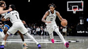 Nov 3, 2025; Brooklyn, New York, USA; Brooklyn Nets center Nic Claxton (33) drives to the basket against the Minnesota Timberwolves during the second half at Barclays Center. Mandatory Credit: John Jones-Imagn Images