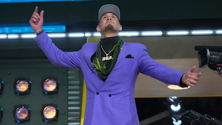 Arizona Wildcats wide receiver Tetairoa McMillan is selected by the Carolina Panthers as the number eight pick in the first round of the 2025 NFL Draft at Lambeau Field. 