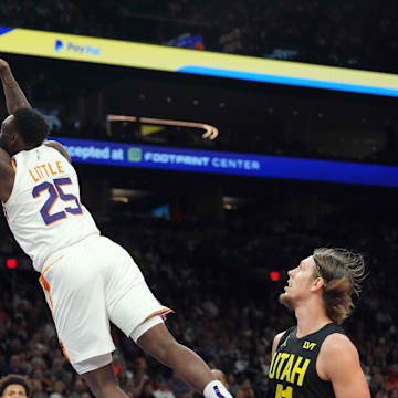 Oct 28, 2023; Phoenix, Arizona, USA; Phoenix Suns forward Nassir Little (25) dunks against the Utah Jazz during the second half at Footprint Center. Mandatory Credit: Joe Camporeale-Imagn Images