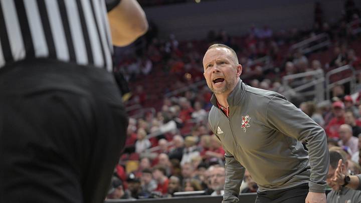 Dec 11, 2024; Louisville, Kentucky, USA;  Louisville Cardinals head coach Pat Kelsey questions a call during the first half against the UTEP Miners at KFC Yum! Center. Mandatory Credit: Jamie Rhodes-Imagn Images