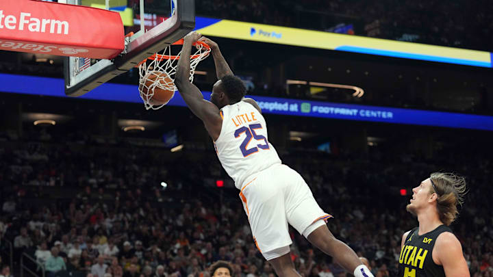 Oct 28, 2023; Phoenix, Arizona, USA; Phoenix Suns forward Nassir Little (25) dunks against the Utah Jazz during the second half at Footprint Center. Mandatory Credit: Joe Camporeale-Imagn Images