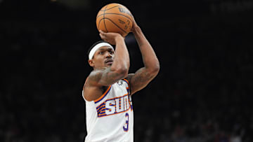 Dec 25, 2024; Phoenix, Arizona, USA; Phoenix Suns guard Bradley Beal (3) shoots against the Denver Nuggets during the first half at Footprint Center. Mandatory Credit: Joe Camporeale-Imagn Images