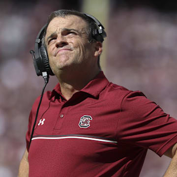 Nov 15, 2025; College Station, Texas, USA; South Carolina Gamecocks head coach Shane Beamer looks up during the second quarter against the Texas A&M Aggies at Kyle Field. Mandatory Credit: Troy Taormina-Imagn Images