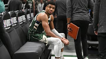 Apr 26, 2023; Milwaukee, Wisconsin, USA; Milwaukee Bucks forward Giannis Antetokounmpo (34) sits on the bench after a 128-126 loss to the Miami Heat during game five of the 2023 NBA Playoffs at Fiserv Forum. Mandatory Credit: Michael McLoone-Imagn Images