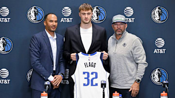 Dallas Mavericks general manager Nico Harrison and first overall pick Cooper Flagg and coach Jason Kidd pose for a photo 