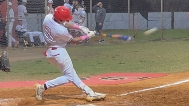 Kelvin Perez of Dade Christian smokes a line-drive double against Cooper City Kelvin Perez of Dade Christian smokes a line-drive double against Cooper City