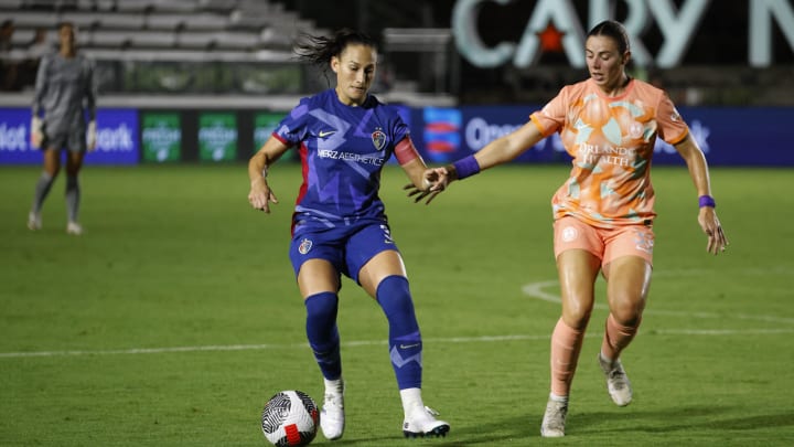 Jul 20, 2024; Cary, North Carolina, USA; North Carolina Courage defender Kaleigh Kurtz (3) plays the ball defend by Orlando Pride forward Alex Kerr (33) in the second half  at WakeMed Soccer Park. Mandatory Credit: Jaylynn Nash-USA TODAY Sports